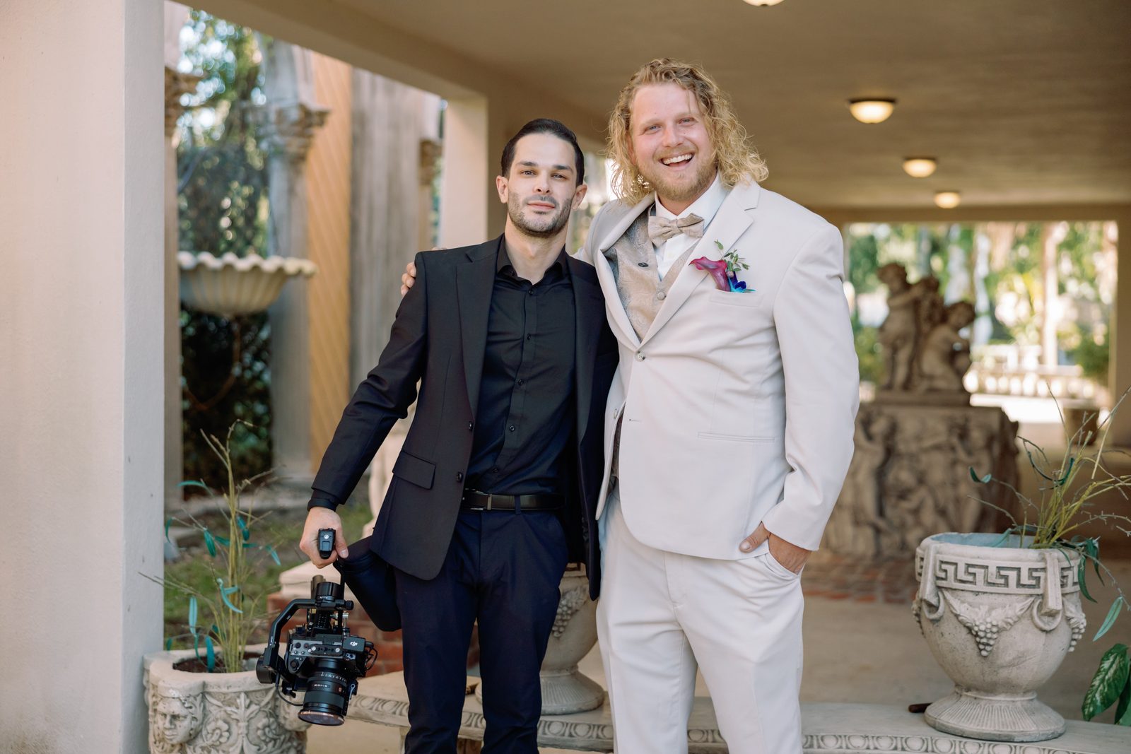 Ricardo Gamboa filming beside the groom, gimbal in hand